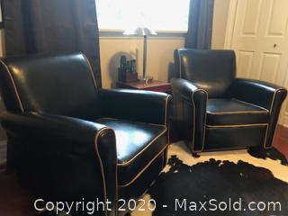 Vintage black leather club chairs with tan trim